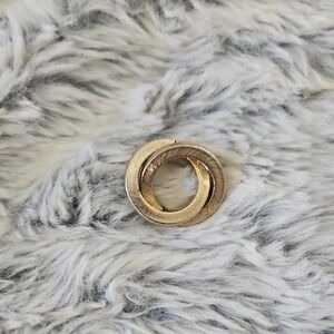 Elegant Gold-Tone Circular Brooch